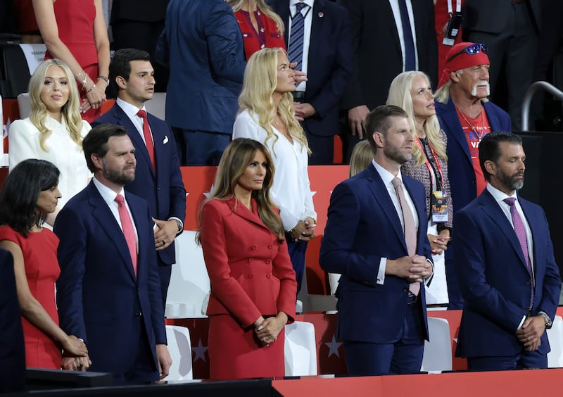 Donald Trump Jr., Eric Trump, former first lady Melania Trump , Republican vice presidential candidate, U.S. Sen. J.D. Vance (R-OH) and Usha Chilukuri Vance look on during the fourth day of the Republican National Convention at the Fiserv Forum.