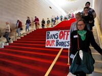 Abortion rights supporters file out of the North Carolina state legislature at the State Capitol in Raleigh, North Carolina, U.S. May 3, 2023.