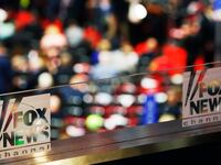 The Fox News logo on pieces of glass.