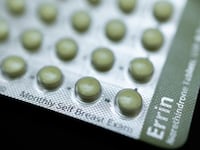 A packet of birth control pills that are unopened.