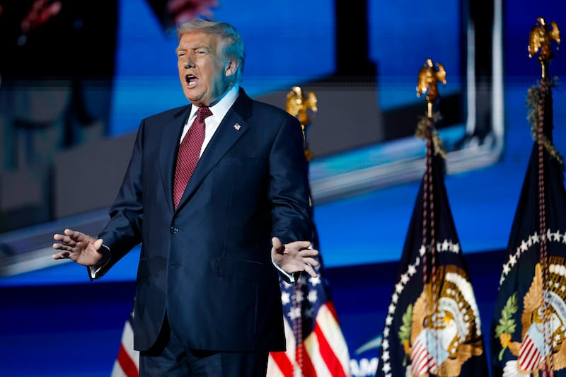 MIAMI, FLORIDA - NOVEMBER 05: U.S. President Donald Trump arrives on stage to deliver remarks during the America Business Forum at the Kaseya Center on November 05, 2025 in Miami, Florida. The forum brings together global leaders, cultural figures and innovators from various sectors for discussions on business, technology and social development. (Photo by Kevin Dietsch/Getty Images)