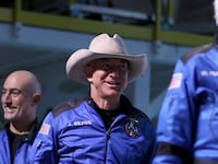 Jeff Bezos arrives for a press conference after flying into space in the Blue Origin New Shepard rocket on July 20, 2021.