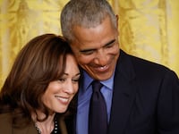 Former President Barack Obama hugs Vice President Kamala Harris