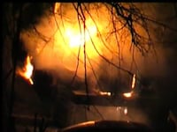 articles/2012/01/06/russian-protesters-use-art-as-act-of-war/voina-burning-police-vehicles-nemtsova_r7tnag