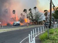 Smoke and flames rise in Lahaina, Maui County, Hawaii, U.S., August 8, 2023 in this still image from video obtained from social media.