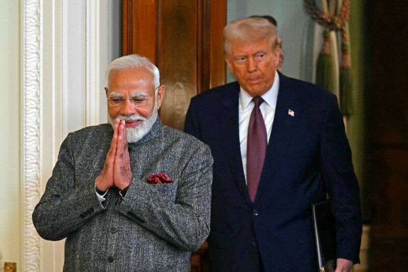 US President Donald Trump and Indian Prime Minister Narendra Modi arrive to hold a joint press conference in the East Room of the White House in Washington, DC, on February 13, 2025. (Photo by ANDREW CABALLERO-REYNOLDS / AFP) (Photo by ANDREW CABALLERO-REYNOLDS/AFP via Getty Images)