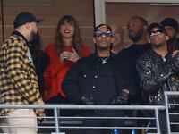 Taylor Swift (center) looks on from the stands during the second half in the AFC Championship football game between the Kansas City Chiefs and the Baltimore Ravens at M&T Bank Stadium.