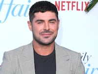 Zac Efron was hospitalized after diving into a swimming pool and ingesting water into his lungs, according to reports.