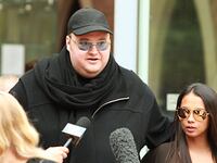 articles/2012/07/12/the-rise-and-fall-of-kim-dotcom-and-megaupload-10-burning-questions-answered/megaupload-singal-tease_yzd9jl