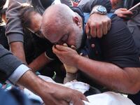 Al Jazeera journalist Wael Al-Dahdouh attends the funeral of his son, Palestinian journalist Hamza Al-Dahdouh