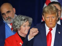Donald Trump with his campaign advisers Susie Wiles and Chris LaCivita