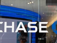 Chase Bank logo on a glass door