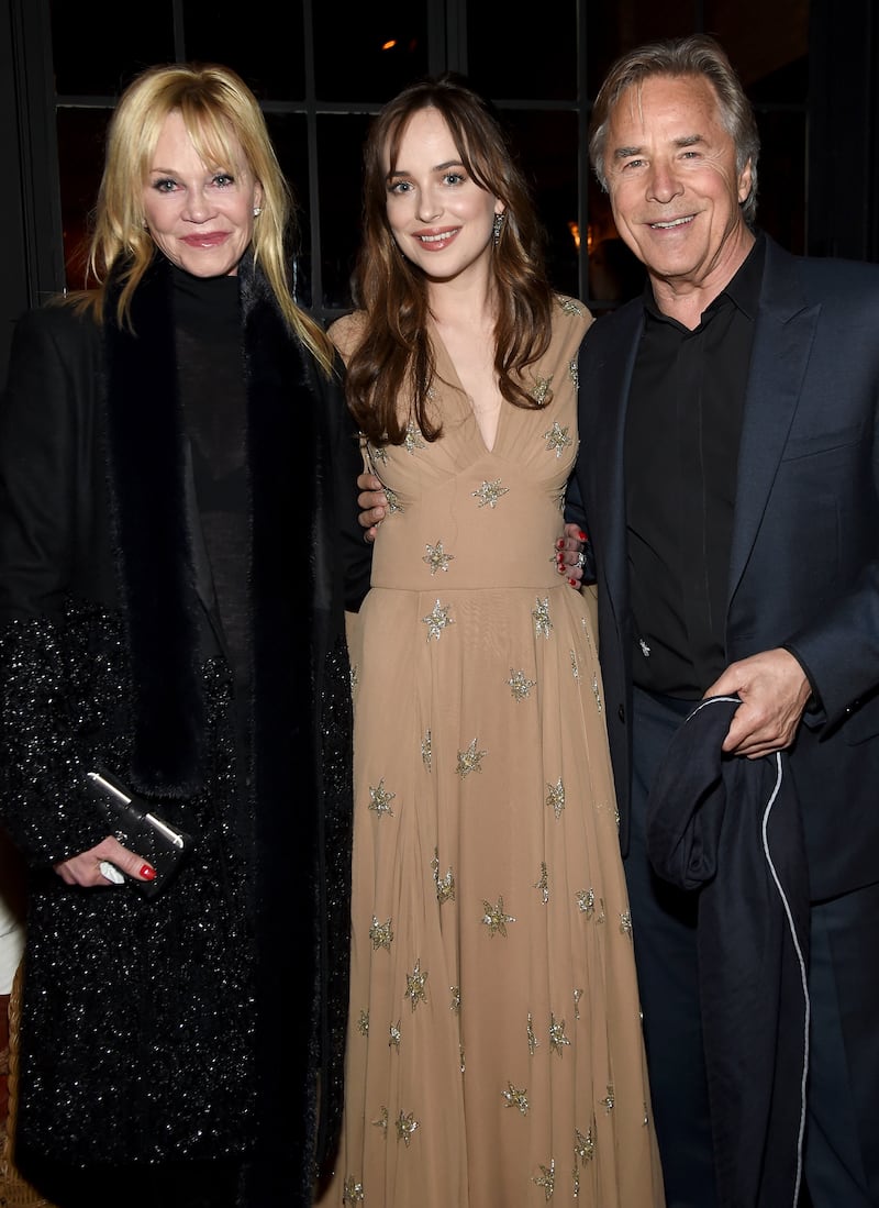 NEW YORK, NY - FEBRUARY 03: Melanie Griffith, Dakota Johnson, and Don Johnson attend the after party for the New York premiere of "How To Be Single" at the Bowery Hotel on February 3, 2016 in New York City. (Photo by Jamie McCarthy/Getty Images)