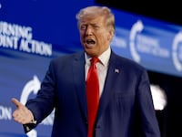 A photo of Former US President Donald Trump arrives on stage to speak at the Turning Point Action in West Palm Beach, Florida. During the event, he went on a wild rant about the so-called “Clinton socks case.”