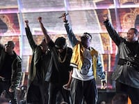 articles/2017/02/13/a-tribe-called-quest-call-out-agent-orange-trump-s-muslim-ban-at-the-grammys/170212-zimmerman-tribe-called-quest-grammys-tease_jmj4mz