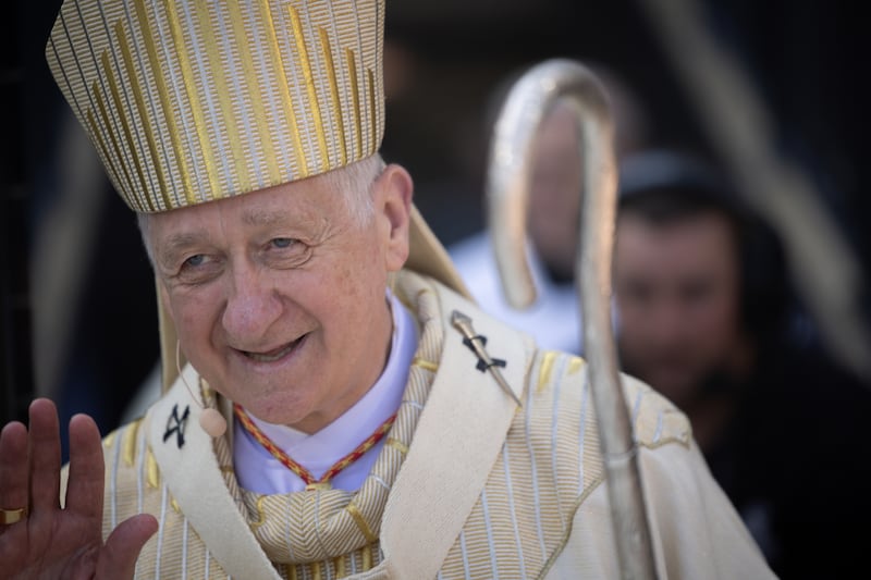Cardinal Blase Cupich walks onto the baseball field at the beginning of a Catholic Mass begins while celebrating the election of Pope Leo XIV with a citywide gathering at Rate Field in Chicago on Saturday, June 14, 2025. (Audrey Richardson/Chicago Tribune/Tribune News Service via Getty Images)