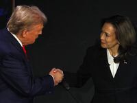 Donald Trump and Kamala Harris shake hands before Tuesday’s debate.
