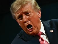 TOPSHOT - US President Donald Trump yells during a campaign rally at the Heartland Credit Union Arena in Park City, Kansas, a suburb of Wichita, on October 19, 2026. (Photo by Kent NISHIMURA / AFP via Getty Images)
