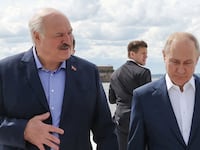 Russian President Vladimir Putin and Belarusian President Alexander Lukashenko walk together in Russia.