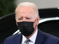 US President Joe Biden wears a face mask as he arrives for the COP26 UN Climate Summit on November 1, 2021 in Glasgow, United Kingdom. 2021 sees the 26th United Nations Climate Change Conference.