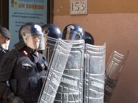 articles/2014/11/14/in-rome-s-riots-cries-for-mussolini-and-attacks-on-refugees/141114-nadeau-rome-protest-tease_wbumdy