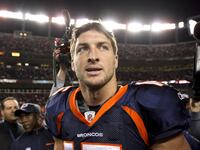 articles/2011/12/14/tebowing-goes-global-aswinning-denver-quarterback-dazzles/tim-tebow-bissinger_b9wppc