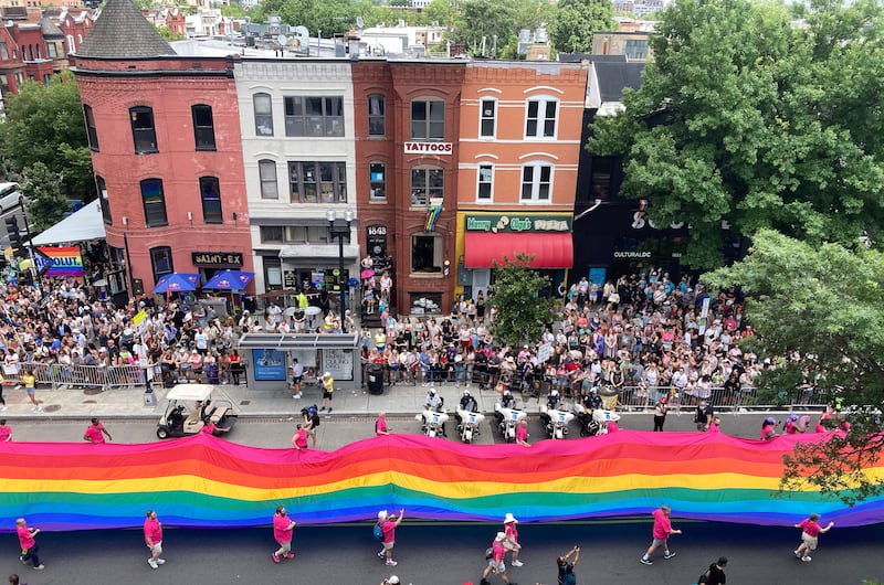 WASHINGTON, D.C., June 07: In a powerful statement against pride flag bans nationwide, the Gilbert Baker Foundation leads WorldPride Parade with a historic 1000-Foot Rainbow Flag during the annual and enhanced Pride parade in conjunction with the WorldPride celebration in Washington, D.C., June 7, 2025. The parade features music, marching bands, and advocacy organizations for the LGBTQ+ community. (Astrid Riecken For The Washington Post via Getty Images)