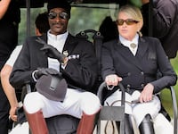 03 August 2024, France, Versailles: Olympics, Paris 2024, equestrian sport, dressage, team, final, US rapper Snoop Dogg and Martha Stewart ride a golf cart. Photo: Rolf Vennenbernd/dpa (Photo by Rolf Vennenbernd/picture alliance via Getty Images)