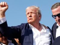 BUTLER, PENNSYLVANIA - JULY 13: Republican presidential candidate former President Donald Trump is rushed offstage during a rally on July 13, 2024 in Butler, Pennsylvania. Butler County district attorney Richard Goldinger said the shooter is dead after injuring former U.S. President Donald Trump, killing one audience member and injuring another in the shooting. (Photo by Anna Moneymaker/Getty Images)