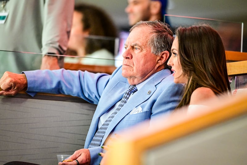 RALEIGH, NORTH CAROLINA - APRIL 22: Head coach Bill Belichick of the North Carolina Tar Heels and Jordon Hudson attend Game Two of the First Round of the 2025 Stanley Cup Playoffs between the Carolina Hurricanes and the New Jersey Devils at Lenovo Center on April 22, 2025 in Raleigh, North Carolina. (Photo by NHL Images/NHLI via Getty Images)