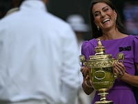 Catherine, Princess of Wales prepares to give the winner's trophy to Spain's Carlos Alcaraz following his victory against Serbia's Novak Djokovic
