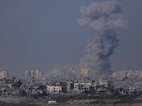 Smoke rises from an explosion in Gaza on October 28, 2023 seen from Sderot, Israel.
