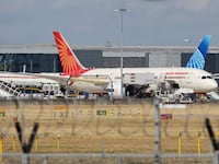 Air India Boeing 787 Dreamliner aircraft as seen at the gates of the terminal of London Heathrow airport during a cloudy day from Myrtle Avenue, a famous planespotting location. The modern and advanced Boeing Dreamliners are 787-8 wide body passenger plane powered by 2x GE jet engines. Air India connects daily India to London with flights from the Indian cities of Ahmedabad, Amritsar, Delhi, Goa, Hyderabad, Kochi and Mumbai. Air India is the Indian flag carrier with headquarters at New Delhi and member of Star Alliance aviation group. Air India is owned by Tata Group, formerly AirIndia Limited was owned by the Government of India. London Heathrow Airport LHR, United Kingdom on August 2022 (Photo by Nicolas Economou/NurPhoto via Getty Images)