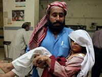 articles/2013/03/30/principal-murdered-in-pakistan-latest-assault-on-girls-schooling/130330-Brown-Schoolkids-Crosshairs-tease_ar3ozk