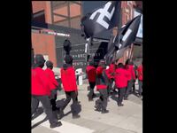 Members of the white supremacist group "Blood Tribe" march through downtown Nashville.
