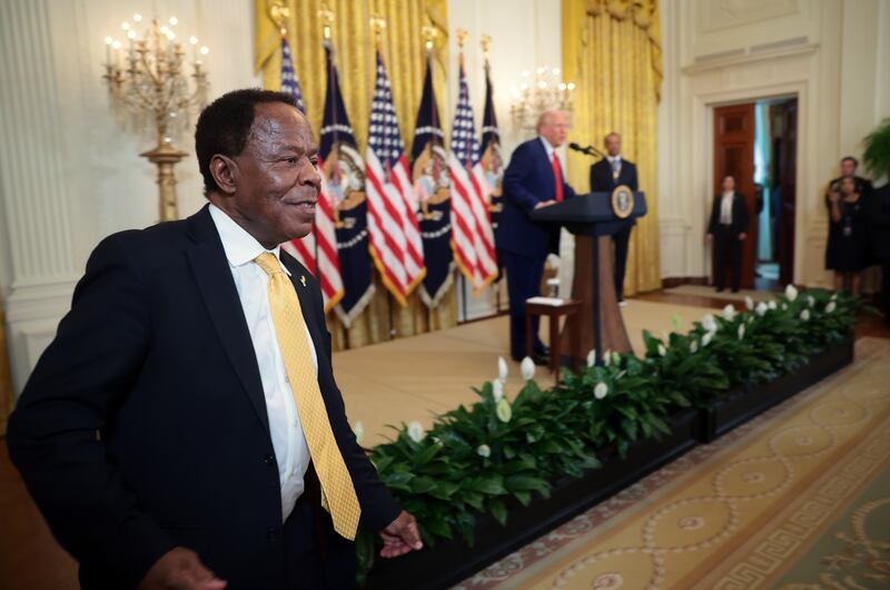 Civil rights attorney Leo Terrell leaves the stage after speaking alongside U.S. President Donald Trump and golf legend Tiger Woods during a reception honoring Black History Month in the East Room of the White House on Feb. 20, 2025 in Washington, D.C.