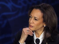 Conspiracy theorists falsley claimed Kamala Harris wore secret earpieces during her debate against Donald Trump.