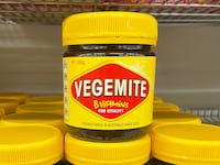 PRODUCTION - 08 July 2022, Australia, Wollongong: Jars of the popular Australian spread Vegemite stand on a shelf in a supermarket. Vegemite was developed around 100 years ago, and the first jar was sold in 1923. (to dpa-Korr "100 years of Vegemite - Australia's most iconic spread") Photo: Michelle Ostwald/dpa (Photo by Michelle Ostwald/picture alliance via Getty Images)