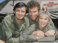 Alan Alda, as Captain Benjamin Hawkeye Pierce, Wayne Rogers, as Captain Trapper John McIntyre, and Loretta Swit, as Major Margaret Houlihan.