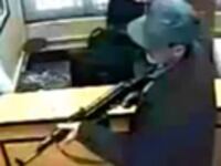 articles/2011/02/24/taliban-attack-video-shows-danger-with-us-negotiations/mosheni-bank-shooting_162186_fofyyn