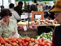 articles/2012/07/01/why-locavorism-doesn-t-make-us-happier-healthier-or-safer/locavore-farmers-market_uwwj7v