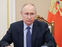 Vladimir Putin chairing a Security Council meeting.