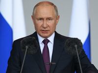 Russian President Vladimir Putin delivers a speech