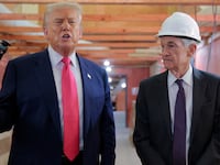 WASHINGTON, DC - JULY 24: U.S. President Donald Trump and Federal Reserve Chair Jerome Powell talk to reporters while touring the Federal Reserve’s $2.5 billion headquarters renovation project on July 24, 2025 in Washington, DC. Trump has been critical of the cost of the renovation, blaming Fed Chair Jerome Powell, whom he has called a "numbskull,” for the cost. Trump has recently threatened to oust Powell because, according to the president, the bank has not lowered interest rates fast enough. (Photo by Chip Somodevilla/Getty Images)