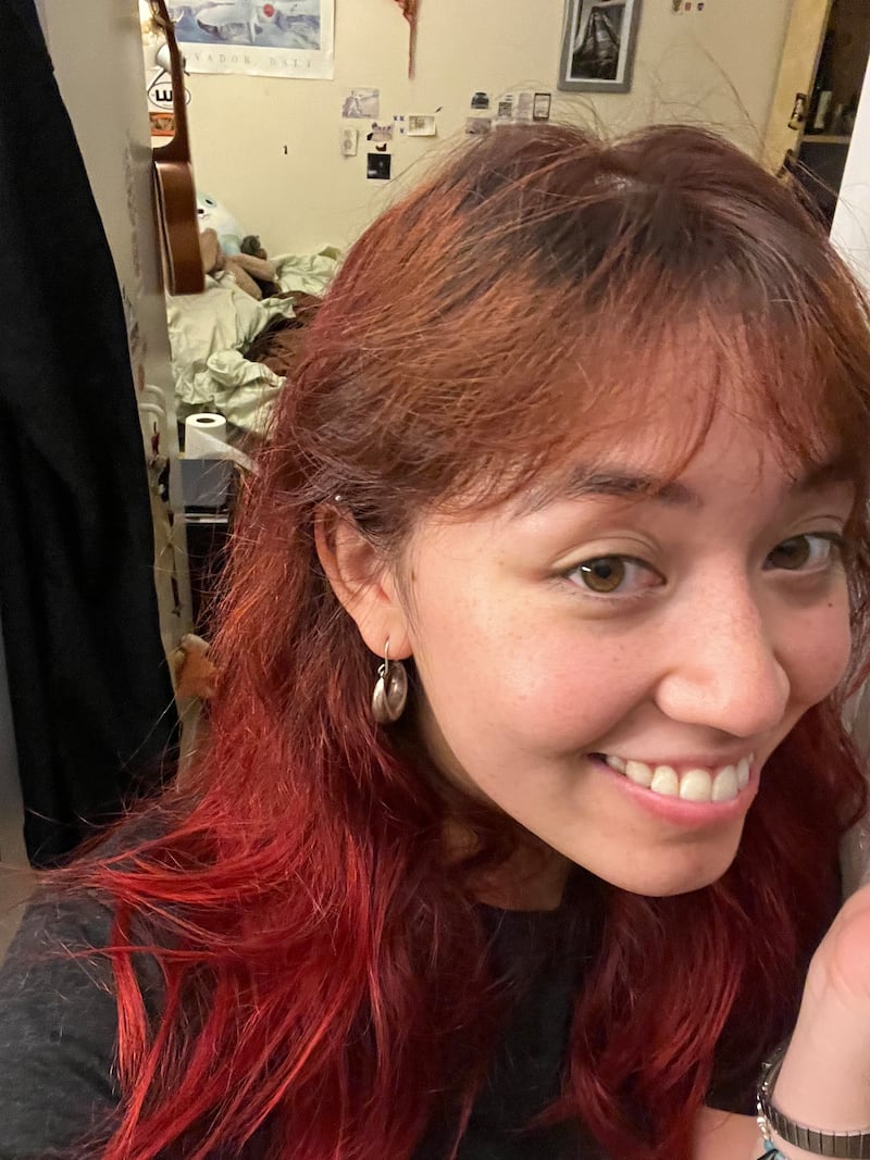 Amber's ratty, botched hair.