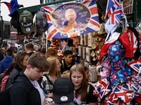 A tourist shop showing King Charles memorabilia.