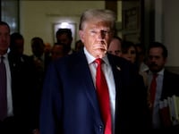 Donald Trump looks on during a break at a Manhattan courthouse as he attends trial in a civil fraud case brought by state Attorney General Letitia James against him in New York City, Oct. 4, 2023.