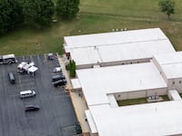 A team of snipers was reportedly inside the building from which a gunman tried to assassinate Donald Trump.