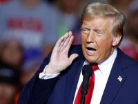 Donald Trump gestures as he speaks at a campaign rally at the Fiserv Forum in Milwaukee, Wisconsin.