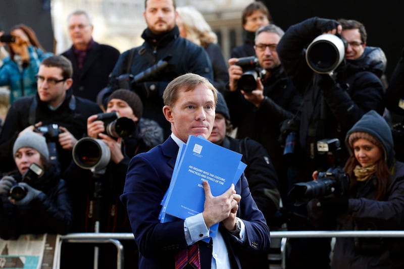 articles/2012/12/01/against-government-regulation-for-british-tabloids/leveson-tabloids-moynihan_t6dhk1